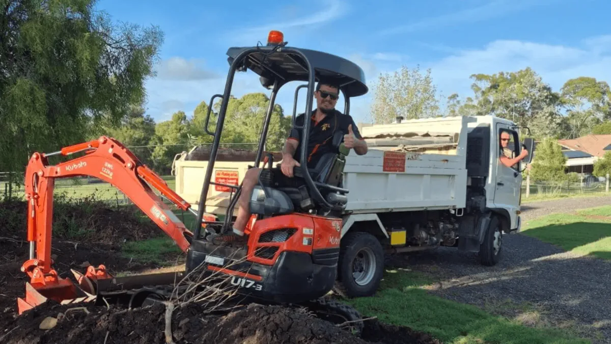 Luke running the excavator and tipper on a Southern Downs job