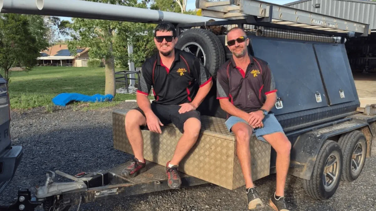 Luke's Plumbing & Gas work trailer on a sunlit Toowoomba job site